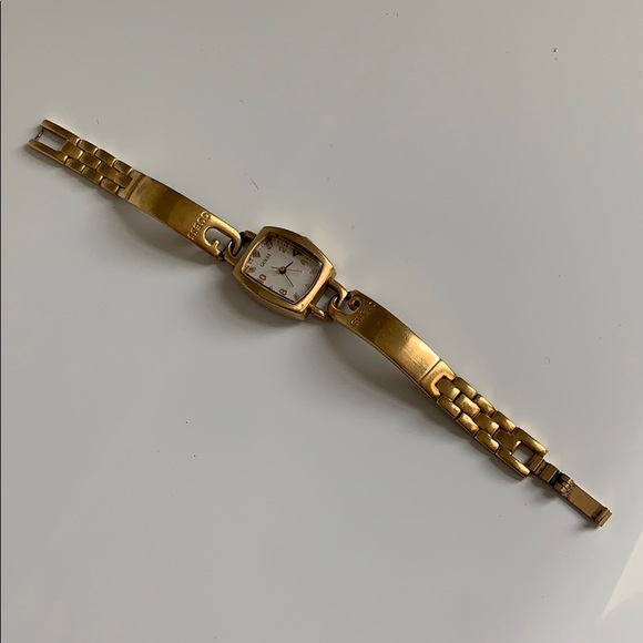 Guess interlocking G skinny gold watch main image 4